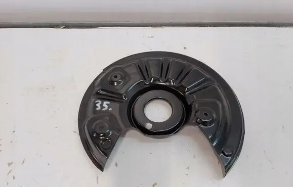 Volkswagen Golf VII Rear brake disc plate dust cover 5Q0615611F