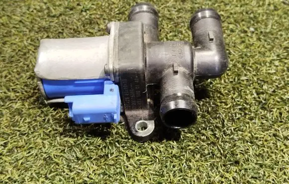 Coolant heater control valve