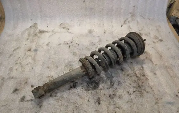 Mitsubishi Pajero Front shock absorber with coil spring