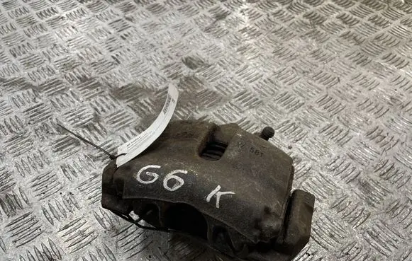 Volkswagen Golf VI Front brake caliper