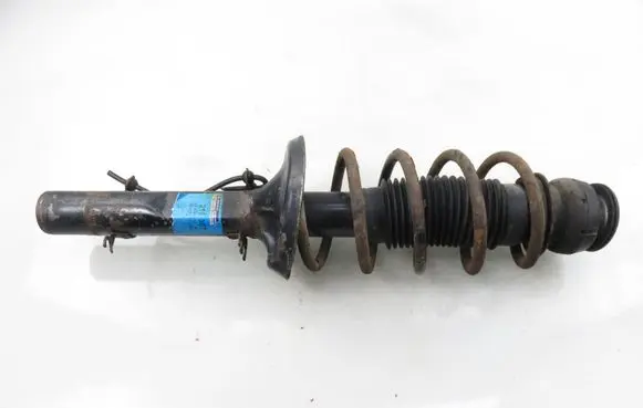 Volkswagen Golf IV Front shock absorber with coil spring 315087