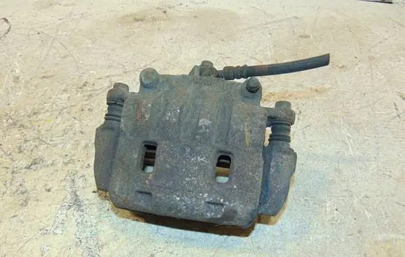 Subaru Legacy Front brake caliper 26292SA001 26225AG080
