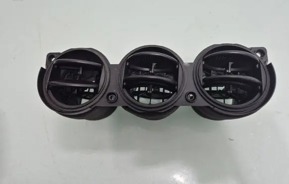 Dash center air vent grill