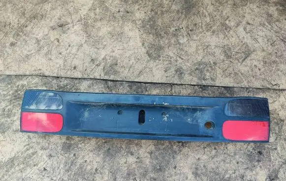 Renault Laguna I Trunk door license plate light bar 7700820049 2600 7704038277