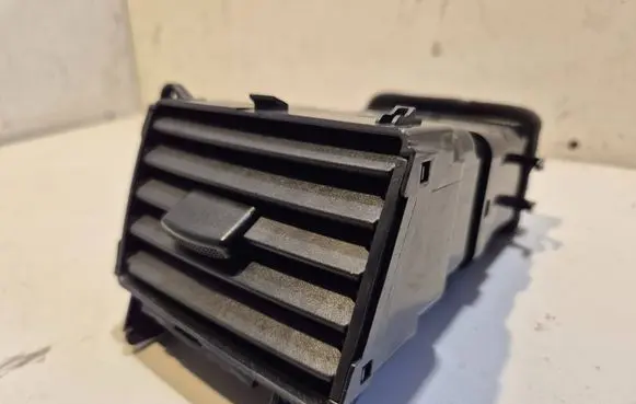 KIA Sportage Dash center air vent grill 974101F500