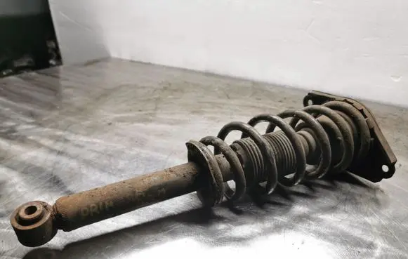 Nissan Primera Rear shock absorber with coil spring 
