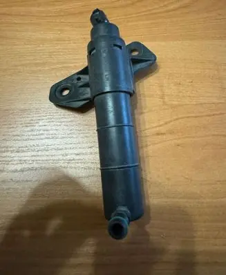KIA Sportage Headlight washer spray nozzle 00066134