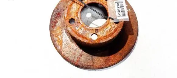 Volkswagen PASSAT B5 Rear brake disc NEVENTILIUOJAMAS
