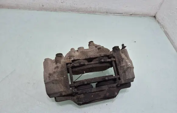 Mitsubishi Pajero Front brake caliper 
