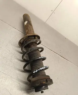Volkswagen Tiguan Front shock absorber with coil spring