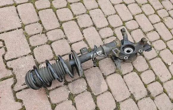 Opel Adam Front shock absorber with coil spring 13450453