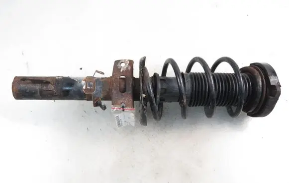 Volkswagen Fox Front shock absorber with coil spring 