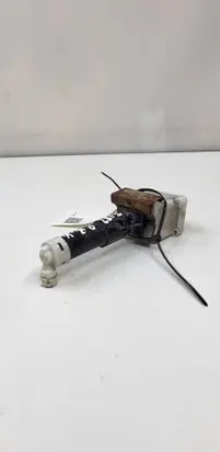Nissan Leaf I (ZE0) Headlight washer spray nozzle 23372