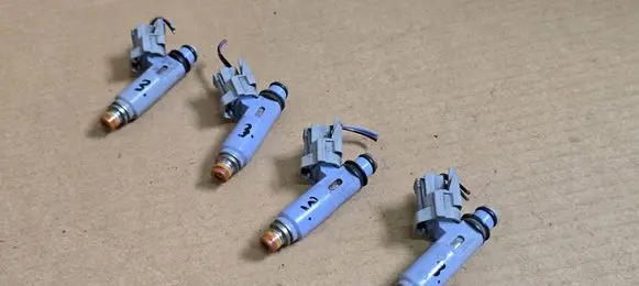 Suzuki Ignis Fuel injectors set 1571080G00 1571080G01