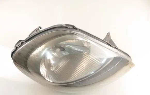 Opel Vivaro Headlight/headlamp 7700311372