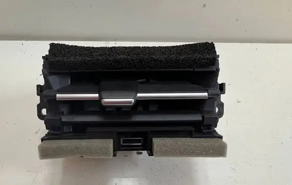 Mazda 2 Dash center air vent grill D09W64930