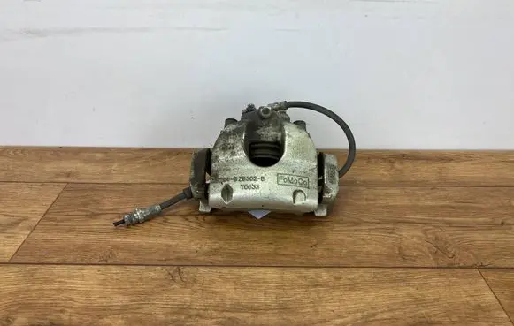 Ford Escape IV Front brake caliper