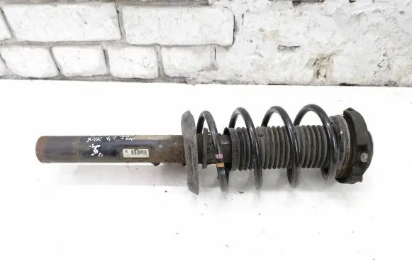 Volkswagen Golf V Front shock absorber with coil spring 1K0413031BF