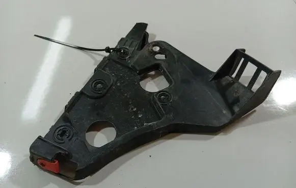 Opel Astra J Front bumper mounting bracket 13264474