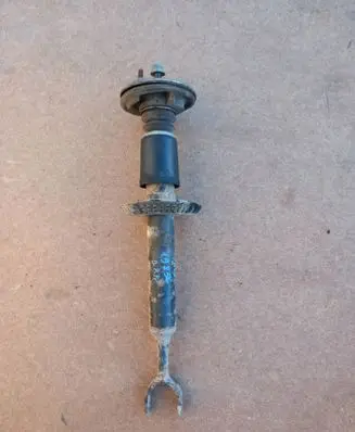Volkswagen PASSAT B5 Front shock absorber/damper 8D0412103B