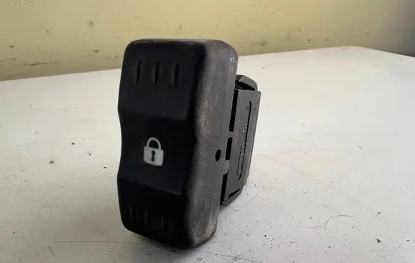 Dacia Logan I Central locking switch button 