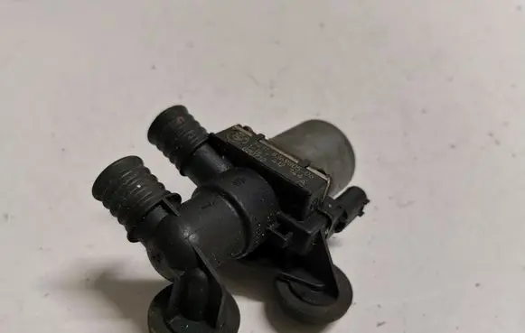 Coolant heater control valve