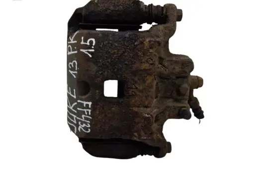 Nissan Juke I F15 Front brake caliper