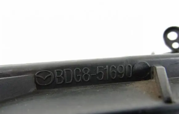 Mazda 3 II Headlight/headlamp mounting bracket BDG851690