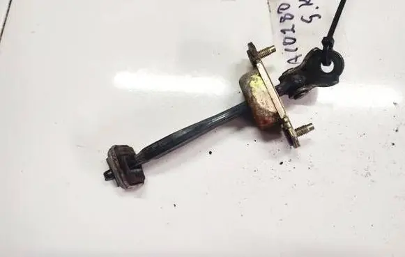 Subaru Legacy Rear door check strap stopper 