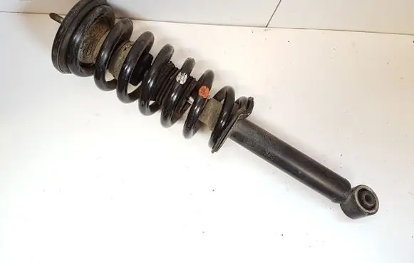 Mitsubishi Pajero Front shock absorber with coil spring MR554292