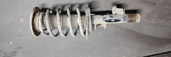 Front shock absorber with coil spring