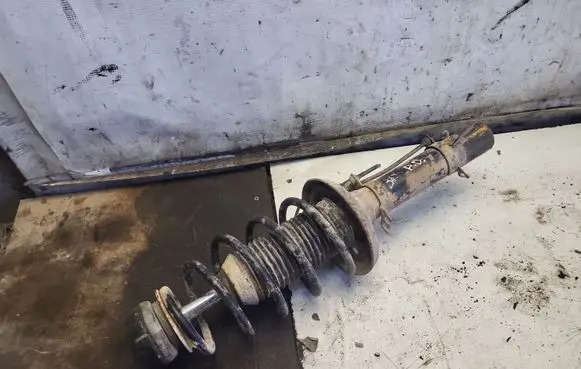 Volkswagen Golf IV Front shock absorber with coil spring 