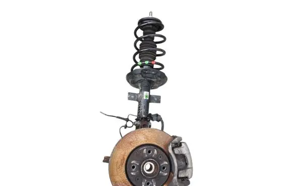 Dacia Sandero III Front shock absorber with coil spring 