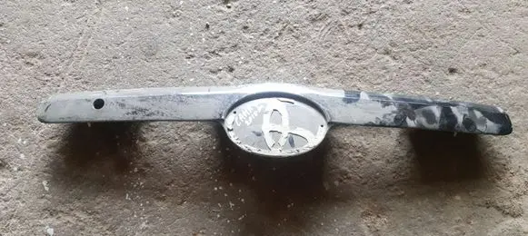 Toyota Camry Trunk door license plate light bar 768010612C