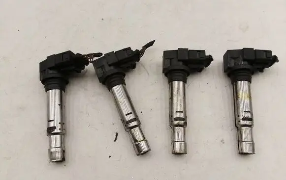 Volkswagen Golf V High voltage ignition coil 0040102030 036905715C