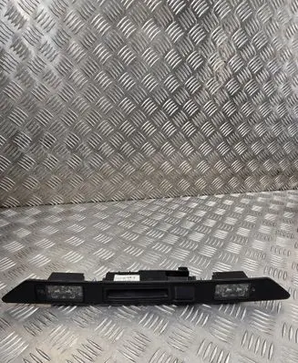 Trunk door license plate light bar