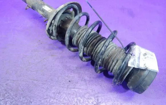 Audi A3 S3 8L Front shock absorber with coil spring 1J0413031N