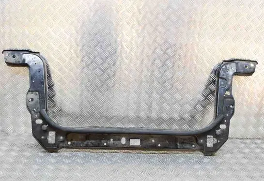Top upper radiator support slam panel