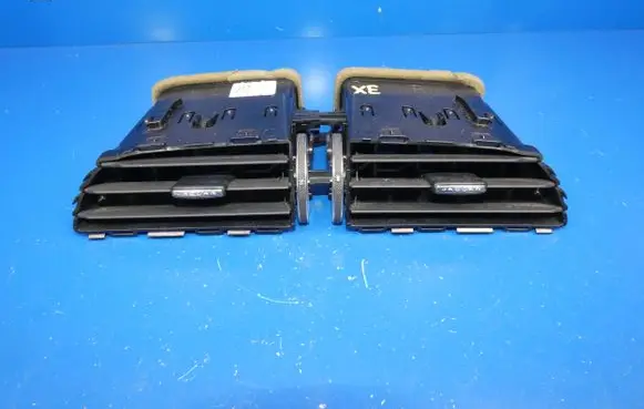 Jaguar XE Dash center air vent grill GX73014L21BB 09467 27022015
