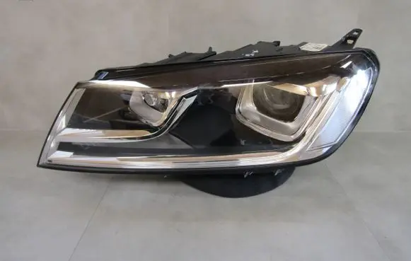 Volkswagen Touareg II Headlight/headlamp 7P1941033A