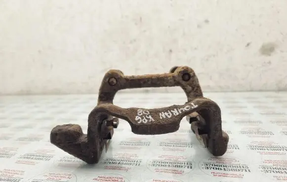 Volkswagen Touran I Brake caliper pad carrier rear 
