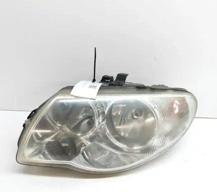 Chrysler Voyager Headlight/headlamp 04857831AC
