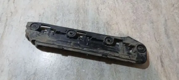 Volkswagen Touran I Front bumper mounting bracket 1T0807935
