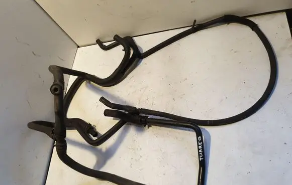 Volkswagen Touareg I Engine coolant pipe/hose 7L6122447BD KA4116625