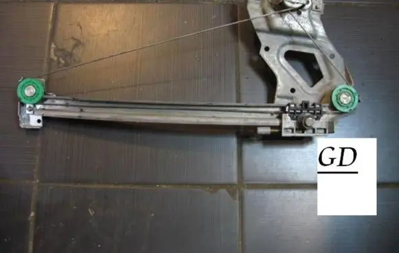 Rear door manual window regulator