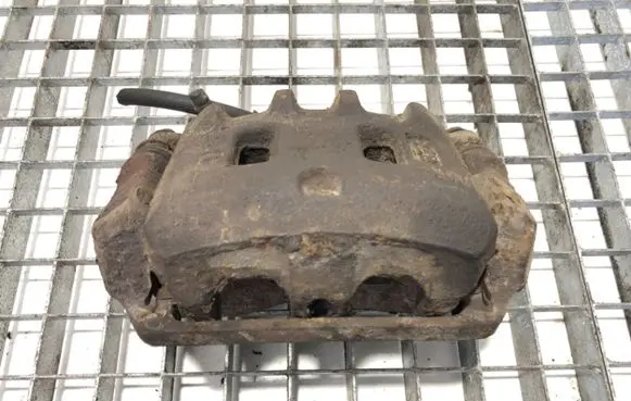 Subaru Forester SF Front brake caliper