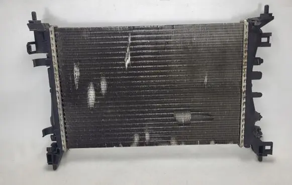 Opel Corsa D Coolant radiator 13399870