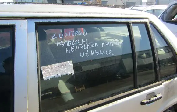 Volvo 940 Rear door window glass 