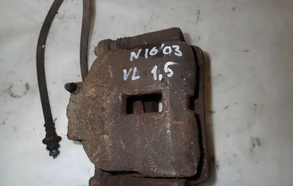 Nissan Almera N16 Front brake caliper