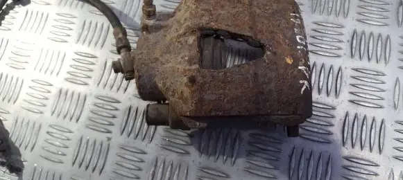 Volkswagen Golf IV Front brake caliper
